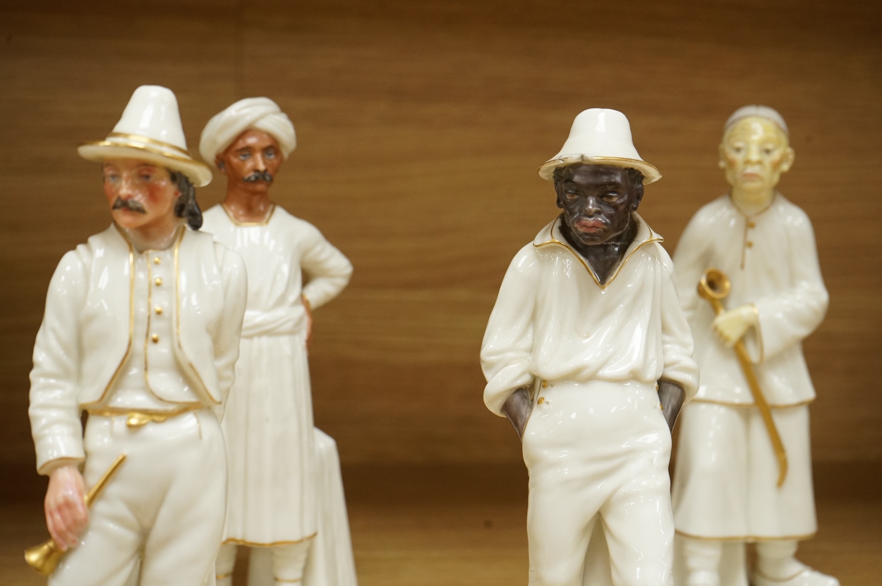 Four Royal Worcester figures from the Countries of the World Series to include Hindu and Chinaman, largest 18cm high